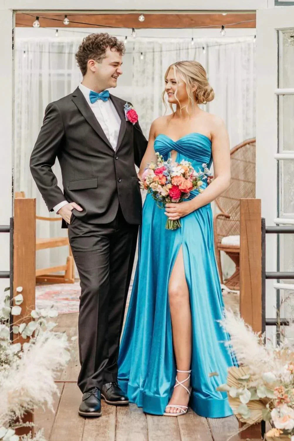 A-line maxi with satin corset strapless neckline and built-in bra slit ball gown
