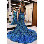 Trumpet/Mermaid Ruffles Luxurious V-Neck Squins Backless Party Prom Dress